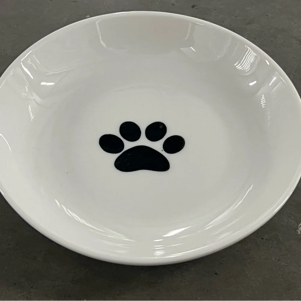 White Ceramic Dog / Cat Bowl with Black Paw. 6” Diameter x 1” High.